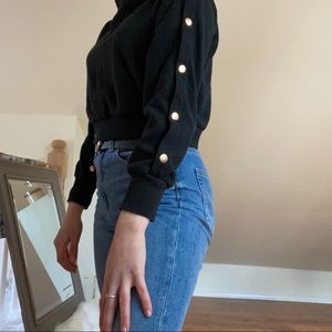 Cropped black sweater with rose gold details